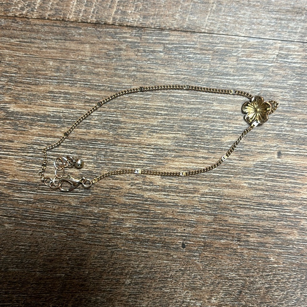 Gold color anklet with flower